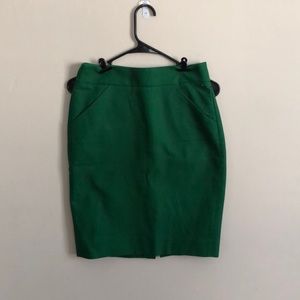 Lightly worn, size 0 bright green pencil skirt by JCrew